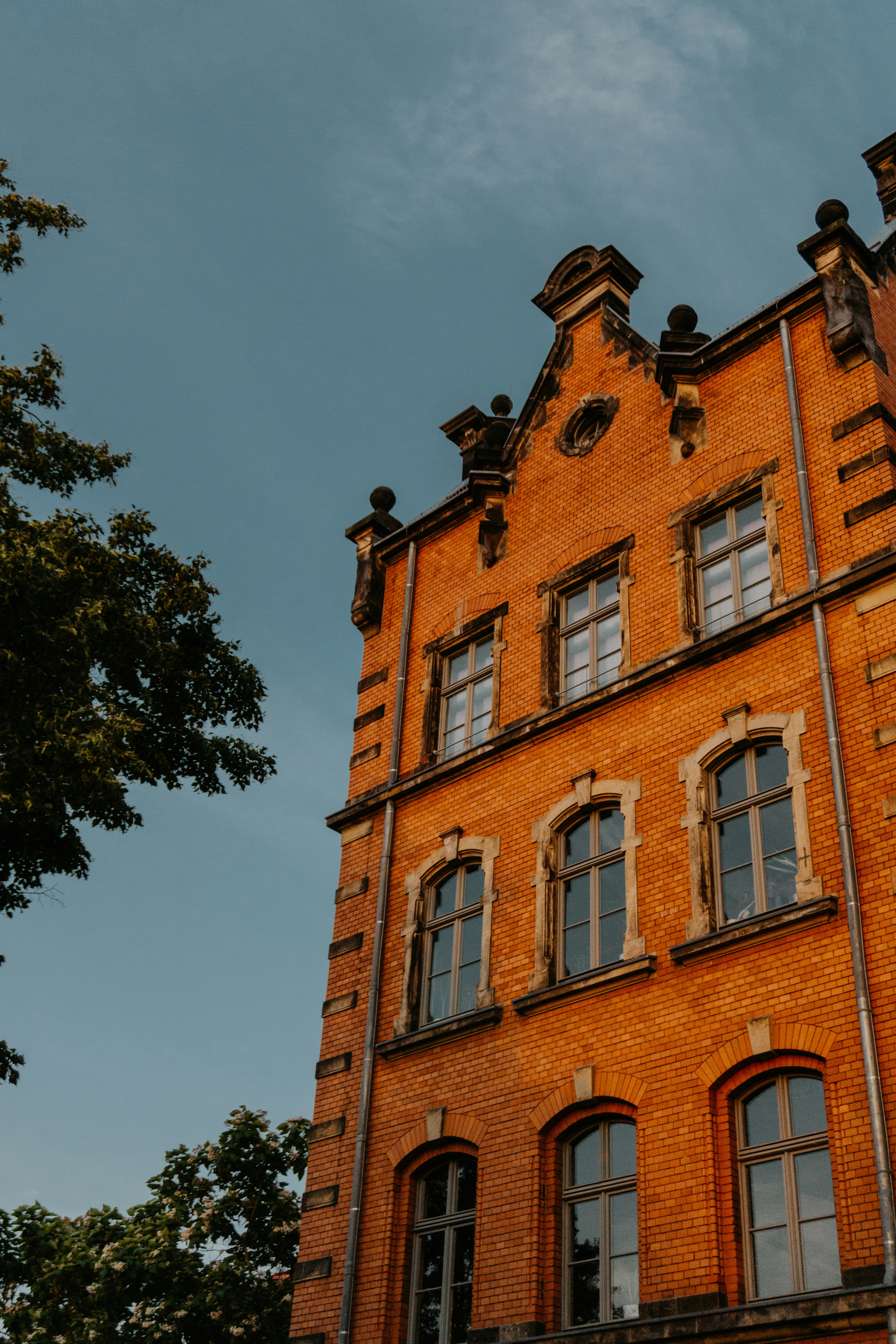 red concrete building under blue sky